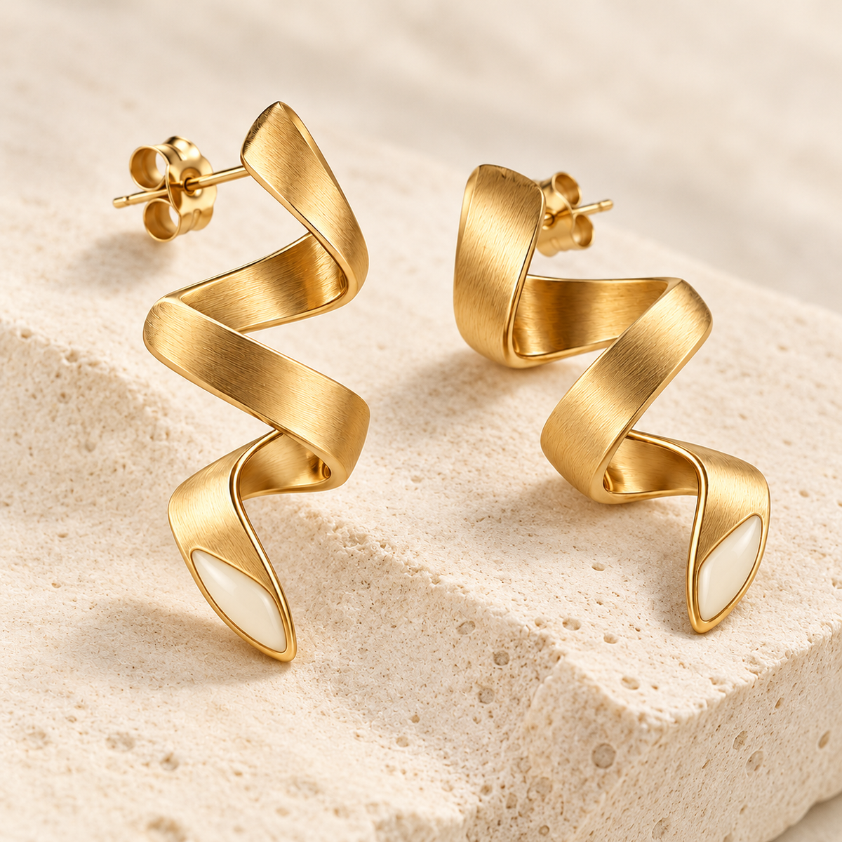 Dune Script earrings, detail view — AI design rendering